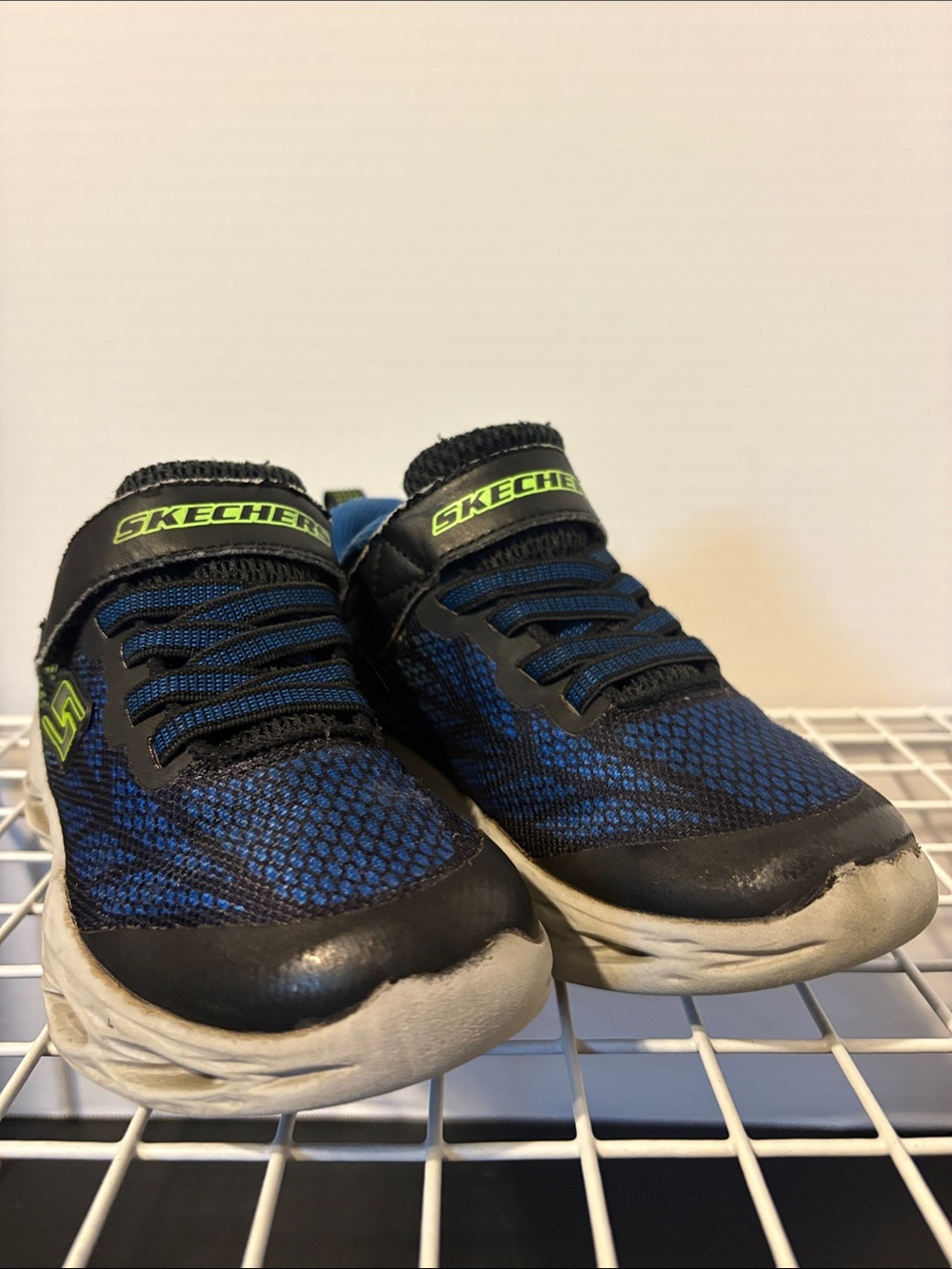 Skechers Boys Blue and Black Slip-On Athletic Sneakers with Neon Accent